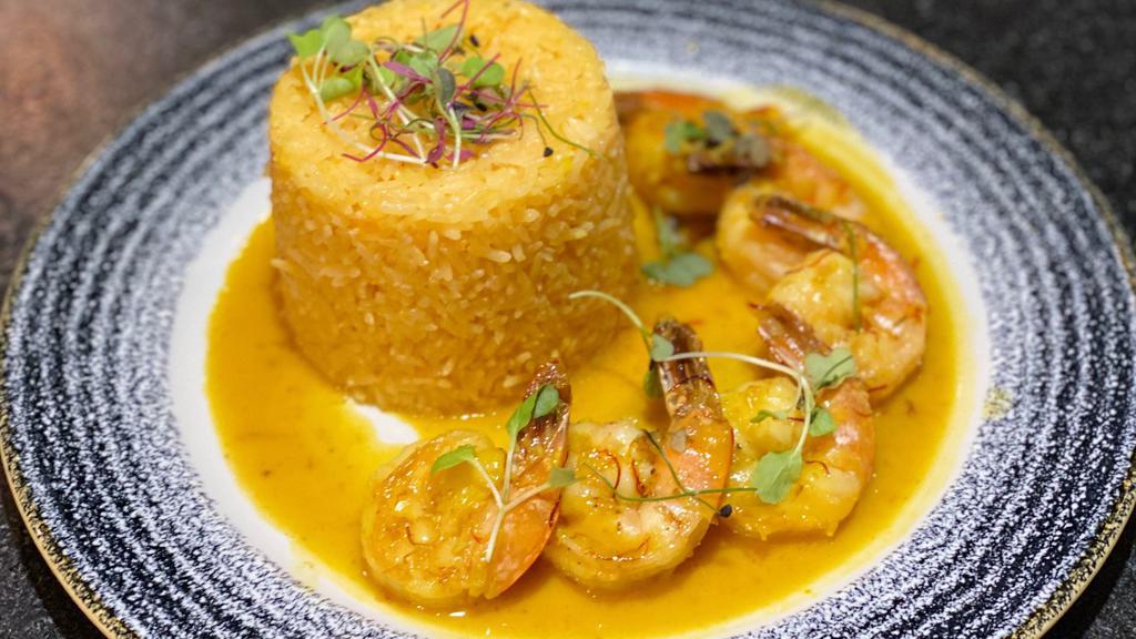 Gambas Al Ajillo · Grilled and charbroiled prawns, garlic sauce, served with Spanish rice