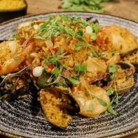 Chaufa De Mariscos · Peruvian fried rice, scrambled egg, shrimp, scallops
calamari, toasted sesame, clams, ginger...
