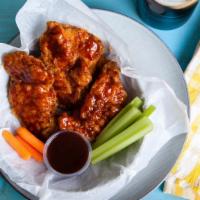 Honey Bbq Chicken Tenders · Golden, crispy chicken tenders fried to perfection, glazed with sweet Honey BBQ sauce.