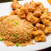 Sesame Chicken · Lightly bread white meat chicken in house brown sauce with sesame on top. Served with brocco...