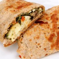Houston Wrap · Delicious Breakfast Wrap made with Eggs, ham, cheese and hash browns. Served on customer's c...