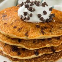 Chocolate Chip Pancakes · 3 Buttery pancakes cooked to perfection and topped with chocolate chips.