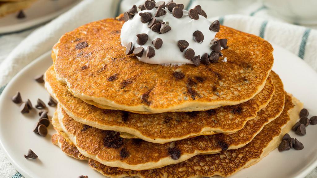 Chocolate Chip Pancakes · 3 Buttery pancakes cooked to perfection and topped with chocolate chips.