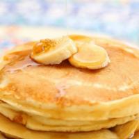 Pancakes With Banana Slices · 3 Buttery pancakes cooked to perfection and topped with fresh banana slices.