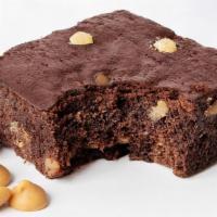 Peanut Butter Bliss Protein Brownie · Every bite of this chocolate brownie filled with peanut butter chips will put you in a state...