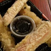 Tempuratizer · Two Shrimp tempura, two Kani crab tempura with ponzu sauce.