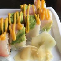 The Park Roll · Spicy Yellowtail cucumber, topped with fluke/striped bass and avocado, drizzled with mango s...
