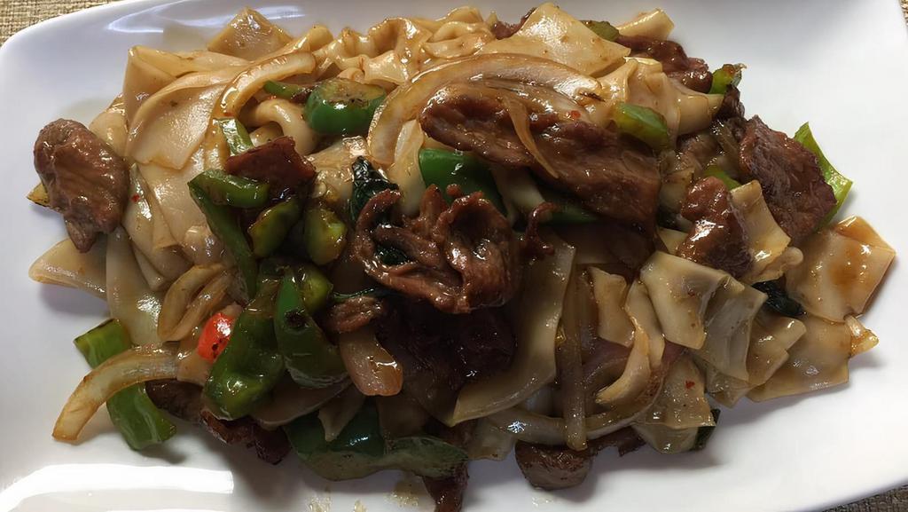 Drunken Noodle (Pad Ki Mao) · Spicy stir-fried rice noodle with basil, onion and bell peppers. Spicy.