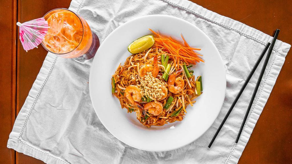 Pad Thai Shrimp · Stir-fried thai noodles with shrimp, egg bean sprout, dry tofu and topped with ground peanuts. Spicy.