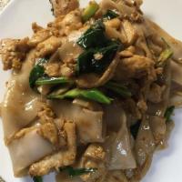 Pad See Yu Chicken · Thai country-style stir-fried broad rice noodles with chinese broccoli and eggs.