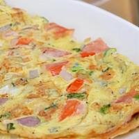 Three Egg Omelette · Three Egg Omelette of your choice served with our delicious homefries.