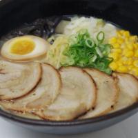 Iron Tonkotsu Ramen · Served with pork loin chashu, cabbage, corn, scallions, kikurage, seaweed, seasoned egg in a...