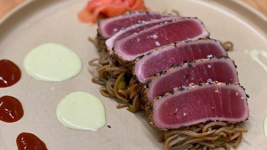 Sashimi Tuna · Served Cold - Seared Rare Sesame Crusted Tuna, Gochujang (spicy) soba noodles, scallions, pickled ginger, wasabi aioli