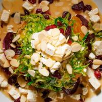 Roasted Beet Salad · Gluten free.  Roasted golden and purple beets, shaved brussels sprouts, sliced almonds, drie...