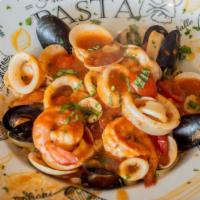 Frutta Di Mare Over Linguini · With shrimp, mussels, clams, and calamari in tomato sauce or fra diablo sauce.