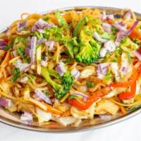Vegetable Chow Mein · (Vegan). Stir fried noodles cooked with vegetables, onion, ginger, garlic, ketchup, soy sauc...