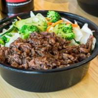 Beef Teriyaki · Steamed rice, steamed veggies & beef with teriyaki sauce.