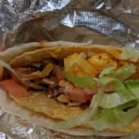 Chicken Taco Loco · One fresh flour tortillas with cheese inside with hard shell taco. served with iceberg lettu...