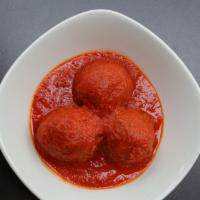 Eggplant Meatballs · Meatless meatballs made with eggplant in crushed tomato sauce