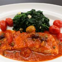 Salmon Puttanesca · baked salmon with tomato, olive and capers with sauteed vegetable