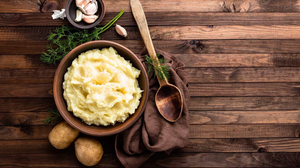 Side Of Mashed Potatoes · A side dish of perfectly cooked buttery mashed potatoes.