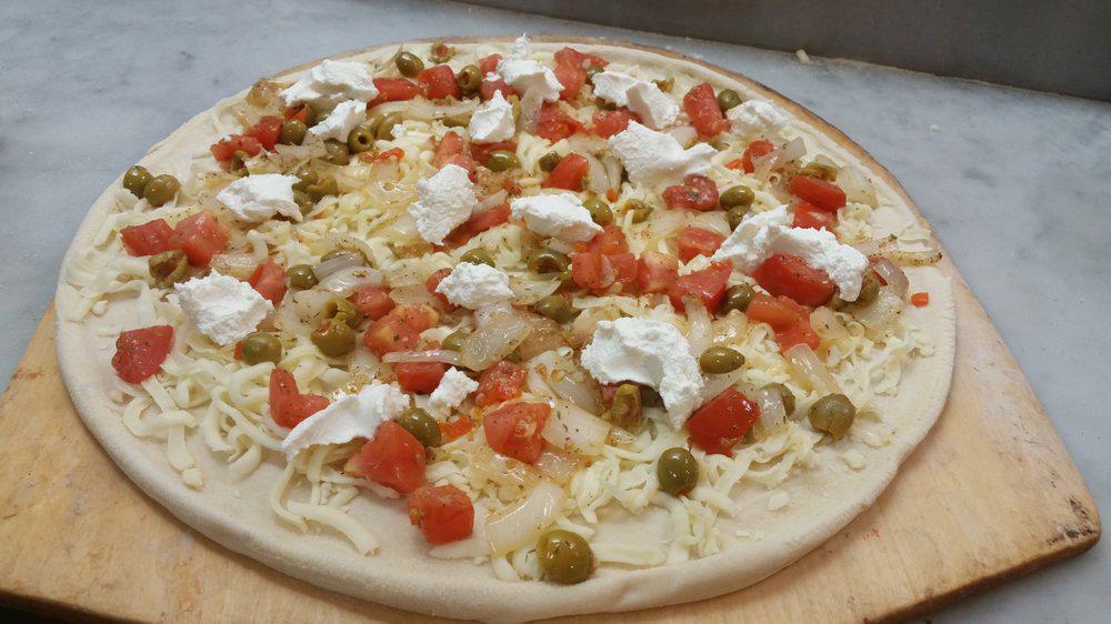 Tricolore (Large) · Mozzarella, fresh tomatoes, baby arugula, prosciutto di Parma, dop parmigiano reggiano.