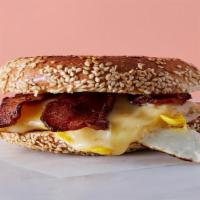The Bec · Bacon, Two Fried Eggs & Cheddar on a Wood-Fired Bagel.