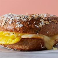 The Plain Jane  · Two Fried Eggs & Cheddar on a Wood-Fired Bagel.