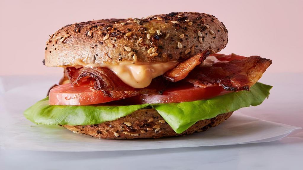 Black Seed Blt · Bacon, Lettuce, Tomato & Spicy Mayo on a Wood-Fired Bagel