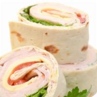 The Emblem Wrap · Delicious hot pastrami with melted swiss cheese, coleslaw, and russian dressing.