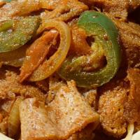 Injera Firfir · Pieces of Injera sauteed in berbere sauce, garlic, tomatoes, jalapeno and  flavored with Eth...