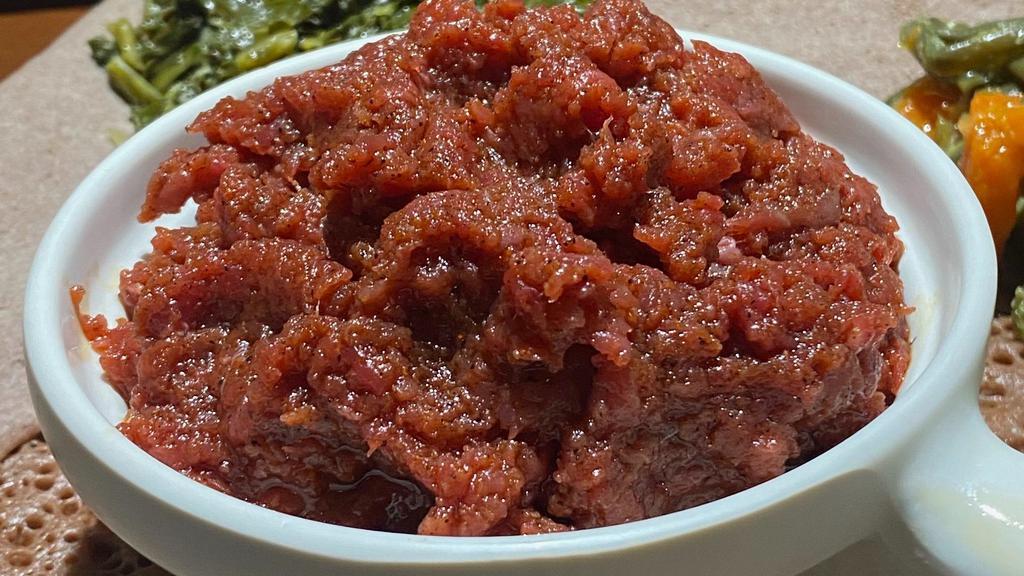 Kitfo · Prime beef tartar seasoned in kibbeh and mitmita with two vegetarian sides except for Engudaye mushroom tibs. All dishes are served with injera.