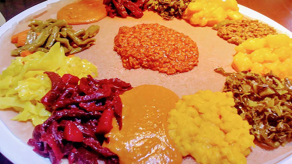 Veggie Sampler For 2 · Combination of all available vegetarian dishes except enguday tips. All dishes are served with Injera.
