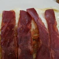 Bacon Omelette · Beaten eggs that are folded over cured pork. add toppings for an extra charge.