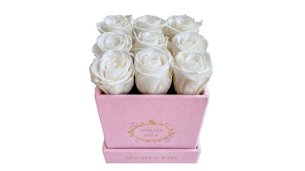Suede Pink La Petite Rose · Seasonal mini-roses selectively bred to stay small and dainty, packaged in our new suede boxes.
