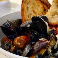 Prince Edward Island Mussels · white wine, roasted cherry tomatoes, shallots, thyme, toasted sourdough