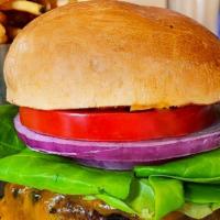 The Classic Burger · special blend ground beef, beefsteak tomato, butter lettuce, brioche bun