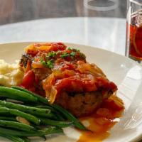 The Meatloaf · garlic whipped potatoes, sautéed green beans, oven roasted tomato relish