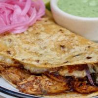 Quesadillas De Chilorio · adobo-marinated chicken, queso chihuahua, poblano, onions, tomatillo crema, corn tortillas