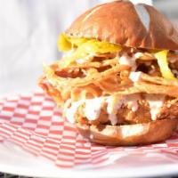 What The Cluck Sandwich · Applewood smoked bacon, Alabama white BBQ sauce, crispy fried onions, banana peppers, pickle...