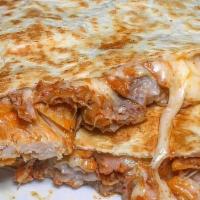 Chicken Quesadilla · Flour tortilla folded with melted Jack cheese, served with guacamole, sour cream and salsa v...