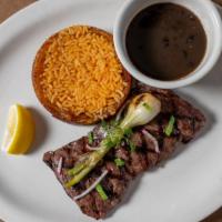 Carne Asada Ibp Quality Beef · Tender skirt steak grilled to your taste served with cebollitas asadas.