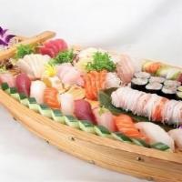 Love Boat For 2 · Served with 10 pieces of assorted sushi, 2 chef's special rolls, 1 piece of tuna roll, 1 pie...