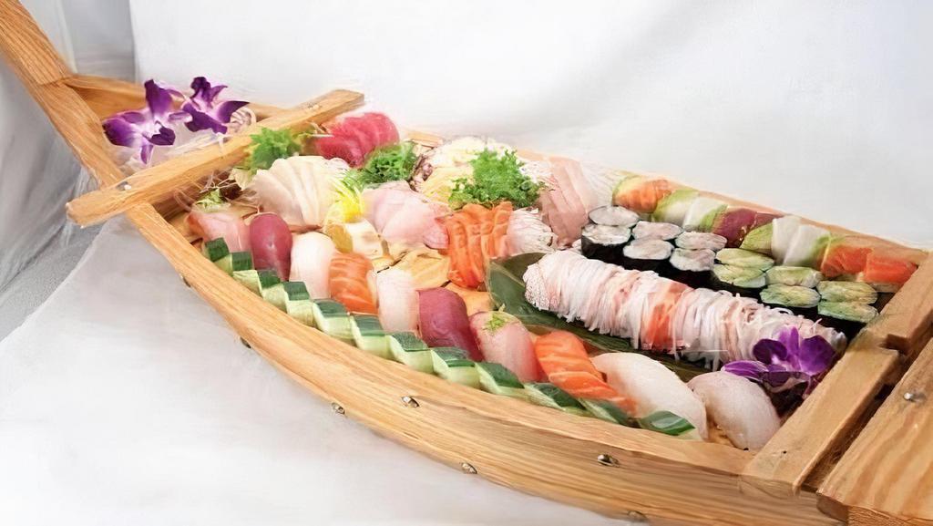 Love Boat For 2 · Served with 10 pieces of assorted sushi, 2 chef's special rolls, 1 piece of tuna roll, 1 piece of salmon roll, and 20 pieces of assorted sashimi.