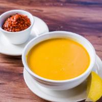 Red Lentil Soup · Puréed red lentils, Turkish seasonings and herbs.