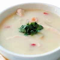 Chicken Vegetable Soup · A chunk of chicken with vegetables.