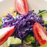Mediterranean Salad · Romaine mesclun, tomato, and red cabbage tossed with olive oil, vinegar and lemon juice.