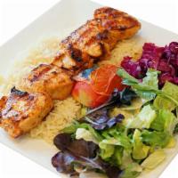 Chicken Shish · Tender chunks of chicken marinated with a blend of herbs, spices, served with rice and salad.