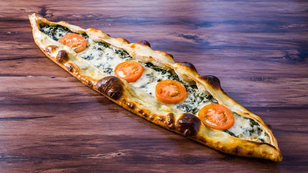 Spinach Pide · Seasoned spinach, onions and cheese.