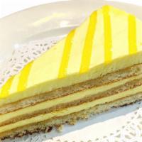Limoncello Mascarpone · Alternating layers of sponge cake and lemon infused mascarpone cream, decorated with Limonce...